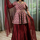 Flared Maroon Silk Lehenga with Intricate Embroidery and Handcrafted Details