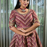 Flared Maroon Silk Lehenga with Intricate Embroidery and Handcrafted Details