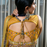 Flared Yellow Lehenga with Intricate Embroidery and Net Dupatta